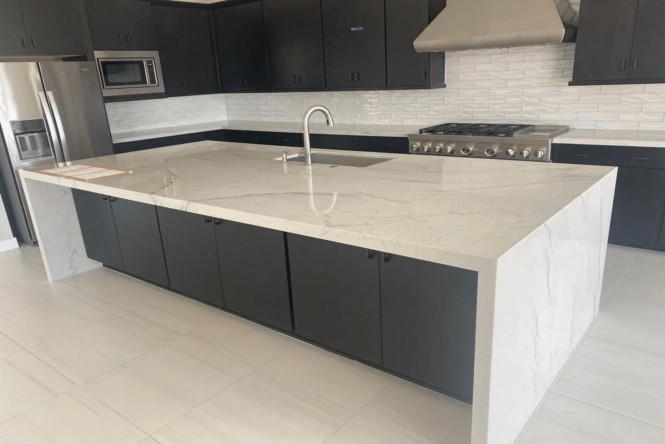 Camelback Renovation — Montauk and White Galaxy quartz kitchens with waterfall islands — material-led spaces built for daily life and longevity.