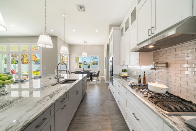 Arcadia Estate — Full interior renovation centered on a Norwall Carrara marble kitchen and a reimagined living and staging program.