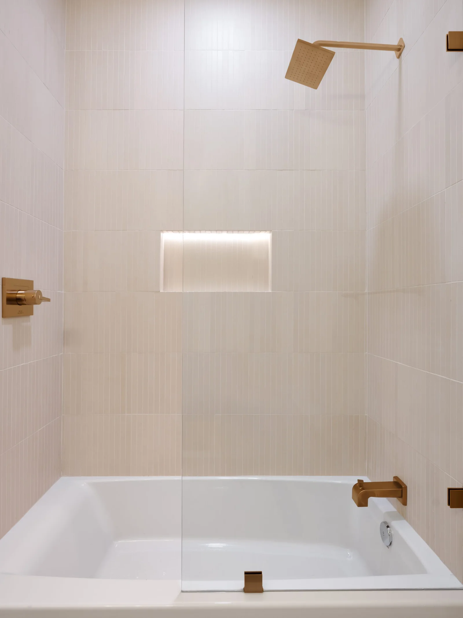Guest bath, stacked tile & lit niche